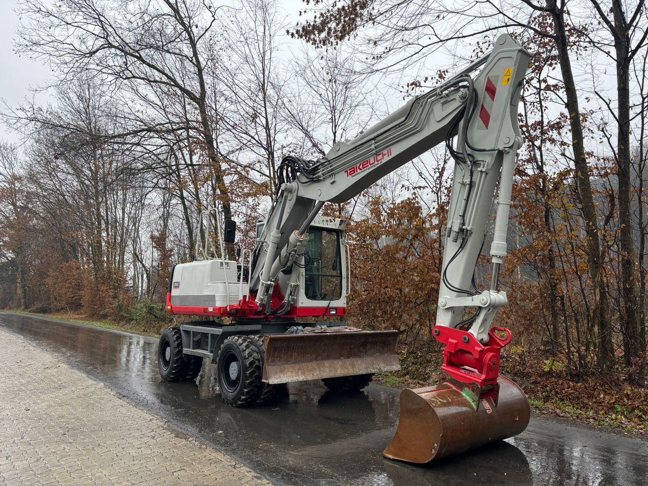 2014 Takeuchi TB 1160 W wheel excavator, side view 2014 Takeuchi TB 1160 W wheel excavator, side view