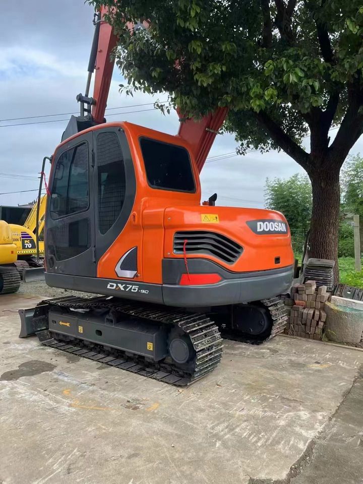 2021 Doosan DX75-9C mini excavator, rear three-quarter view 2021 Doosan DX75-9C mini excavator, rear three-quarter view