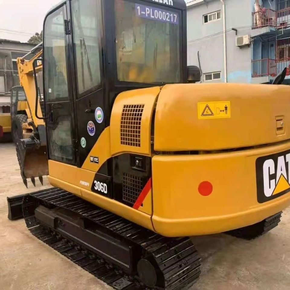 2023 Caterpillar 306D mini excavator, rear three-quarter view