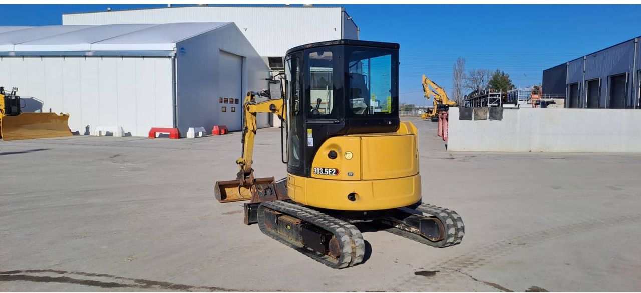 2021 Caterpillar 303.5E2 crawler excavator, rear three-quarter view 2021 Caterpillar 303.5E2 crawler excavator, rear three-quarter view
