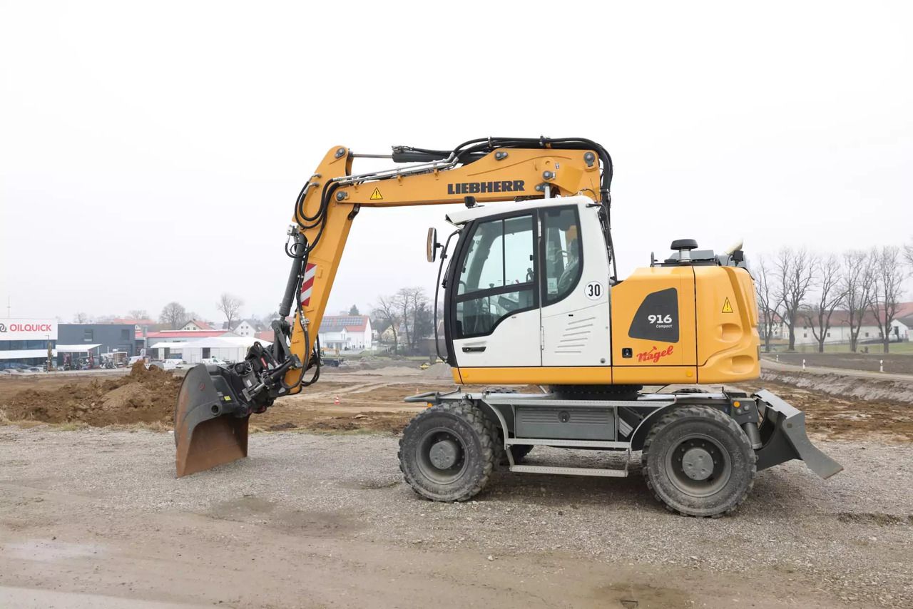 2023 Liebherr A916 Compact wheel excavator, side view 2023 Liebherr A916 Compact wheel excavator, side view