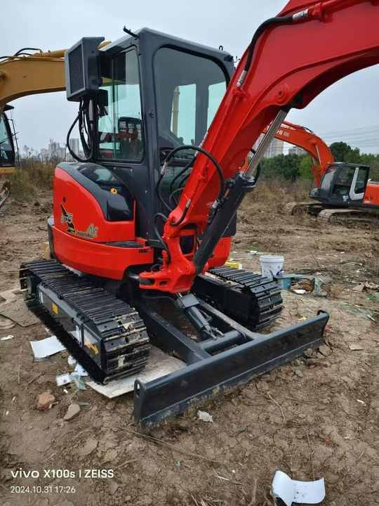 Kubota U25 mini excavator, front three-quarter view Kubota U25 mini excavator, front three-quarter view