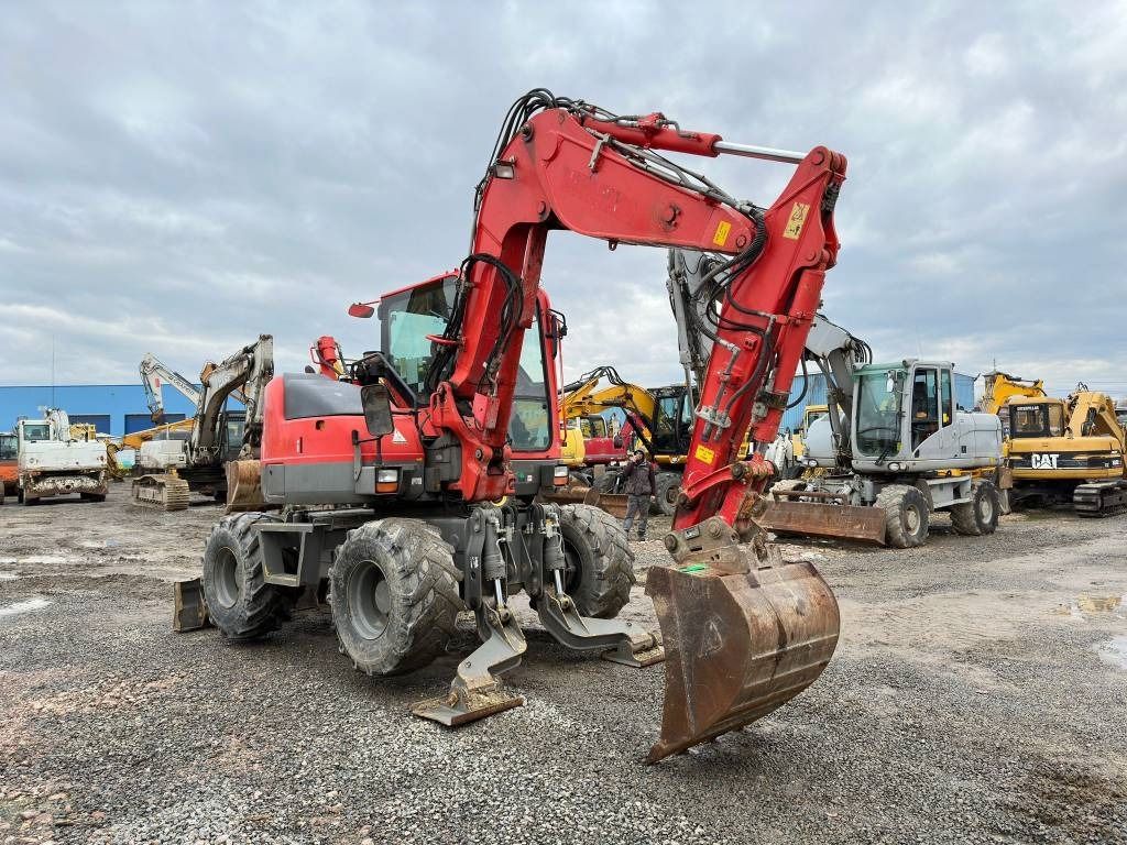 2011 Komatsu PW98MR-8 wheel excavator, front three-quarter view