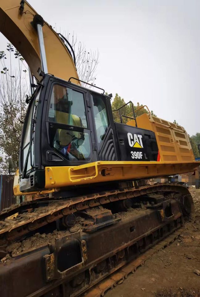 Caterpillar 390F L crawler excavator, side view Caterpillar 390F L crawler excavator, side view