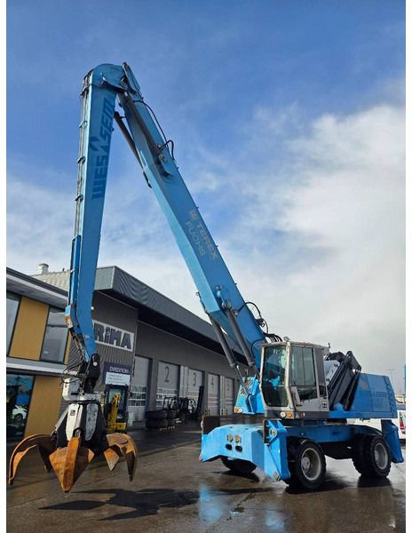 2011 Fuchs MHL360 D material handler, side view