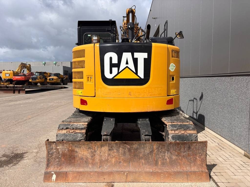 2017 Caterpillar 315FLCR crawler excavator, rear view with blade