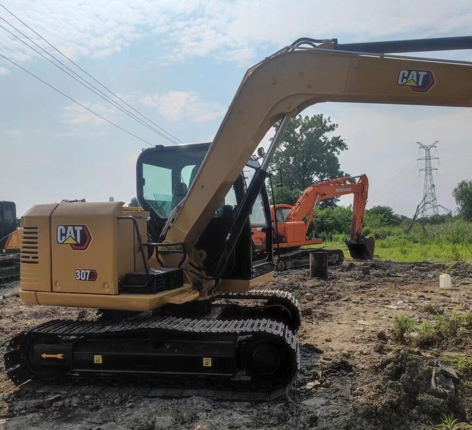 2019 Caterpillar 307E crawler excavator, rear three-quarter view 2019 Caterpillar 307E crawler excavator, rear three-quarter view