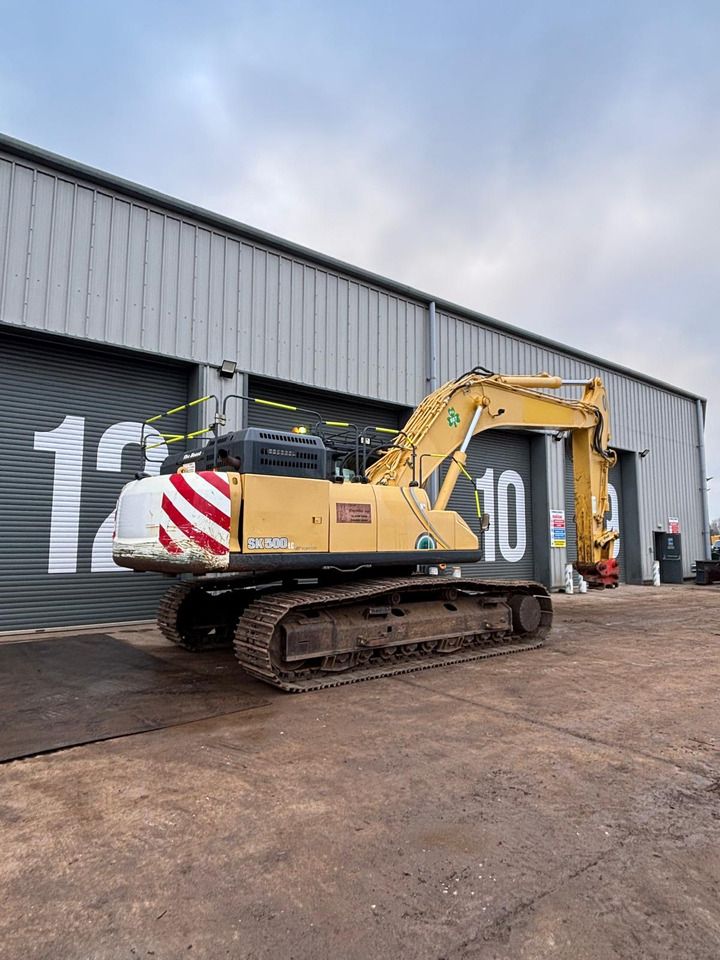 2019 Kobelco SK500LC-10 crawler excavator, rear three-quarter view 2019 Kobelco SK500LC-10 crawler excavator, rear three-quarter view