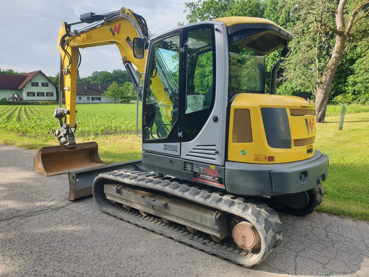 2021 Wacker Neuson ET90 mini excavator, rear three-quarter view 2021 Wacker Neuson ET90 mini excavator, rear three-quarter view