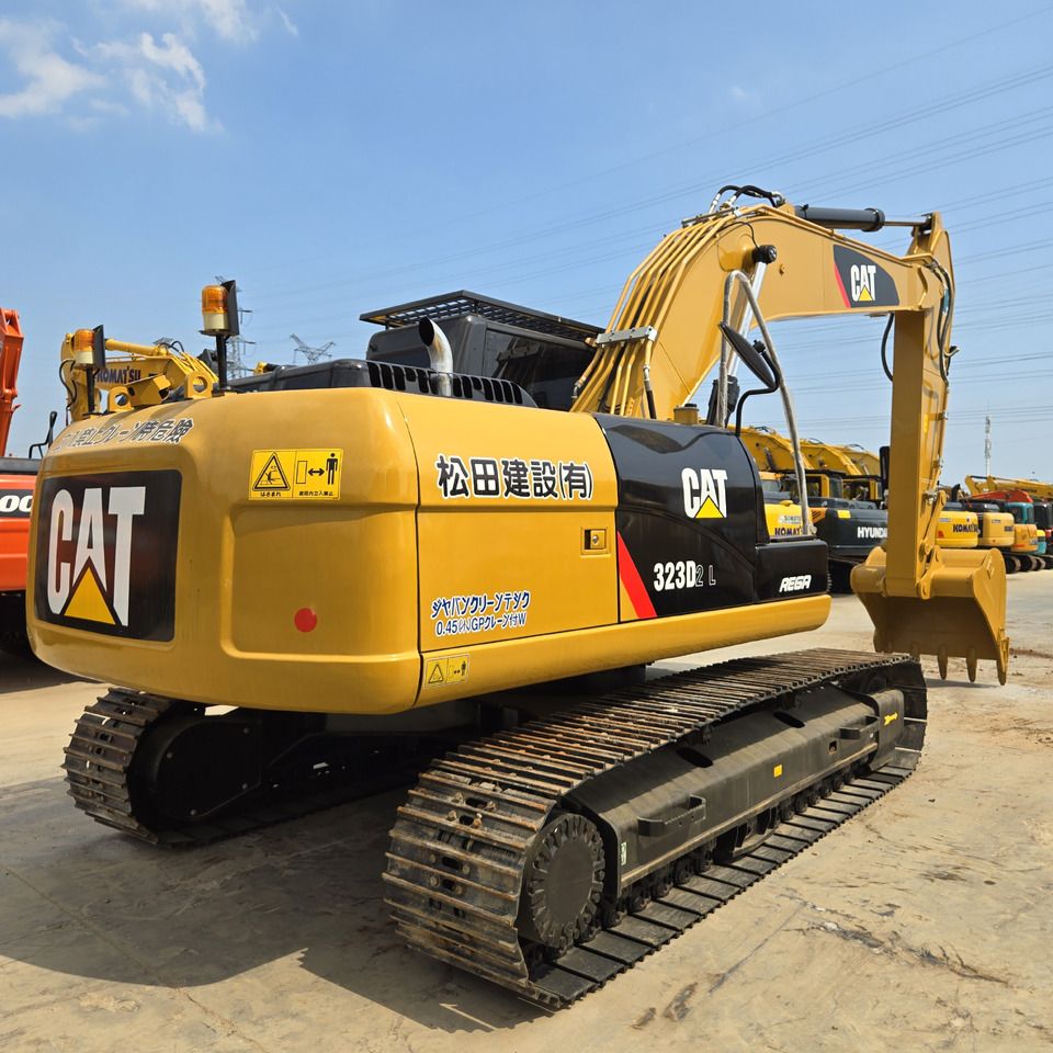 2023 Caterpillar 323D2L crawler excavator, rear three-quarter view