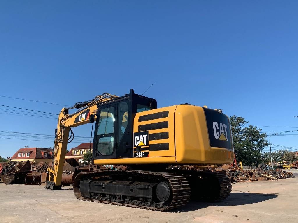 2016 Caterpillar 318F crawler excavator, rear three-quarter view 2016 Caterpillar 318F crawler excavator, rear three-quarter view