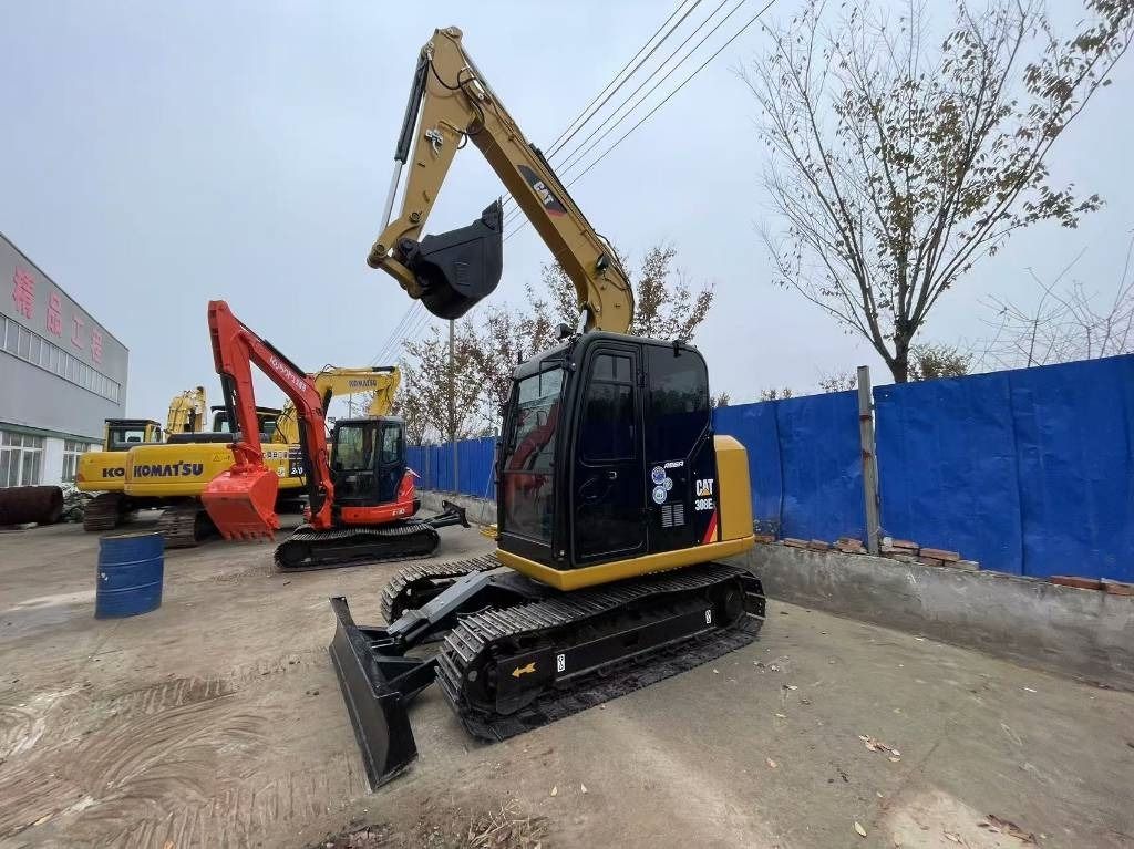 2024 Caterpillar 308E mini excavator, front three-quarter view 2024 Caterpillar 308E mini excavator, front three-quarter view