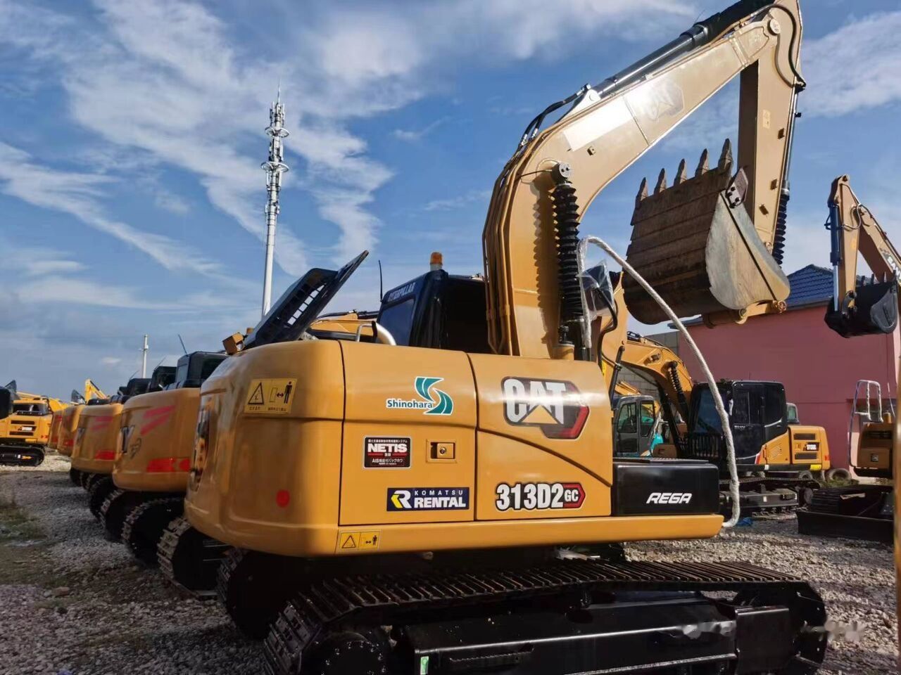 2023 Caterpillar 313D2 GC crawler excavator, rear three-quarter view 2023 Caterpillar 313D2 GC crawler excavator, rear three-quarter view