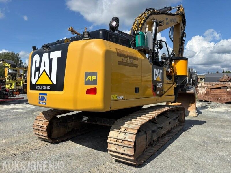 2018 Caterpillar 330F crawler excavator, rear three-quarter view 2018 Caterpillar 330F crawler excavator, rear three-quarter view