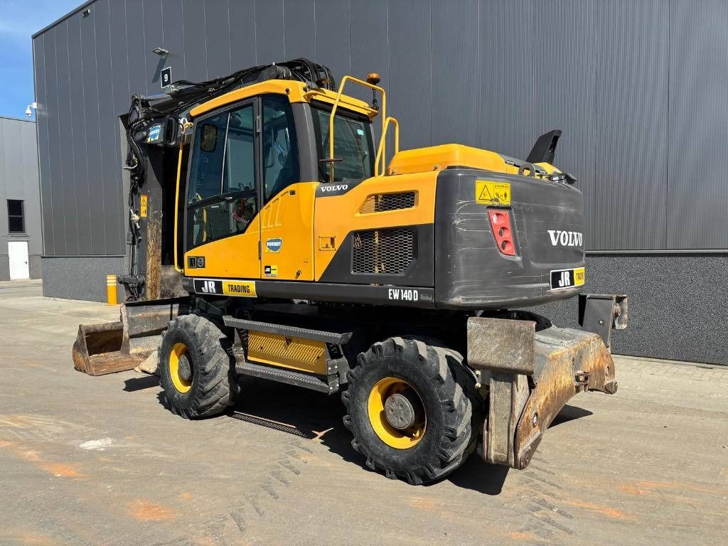 2017 Volvo EW140D wheel excavator, rear three-quarter view 2017 Volvo EW140D wheel excavator, rear three-quarter view