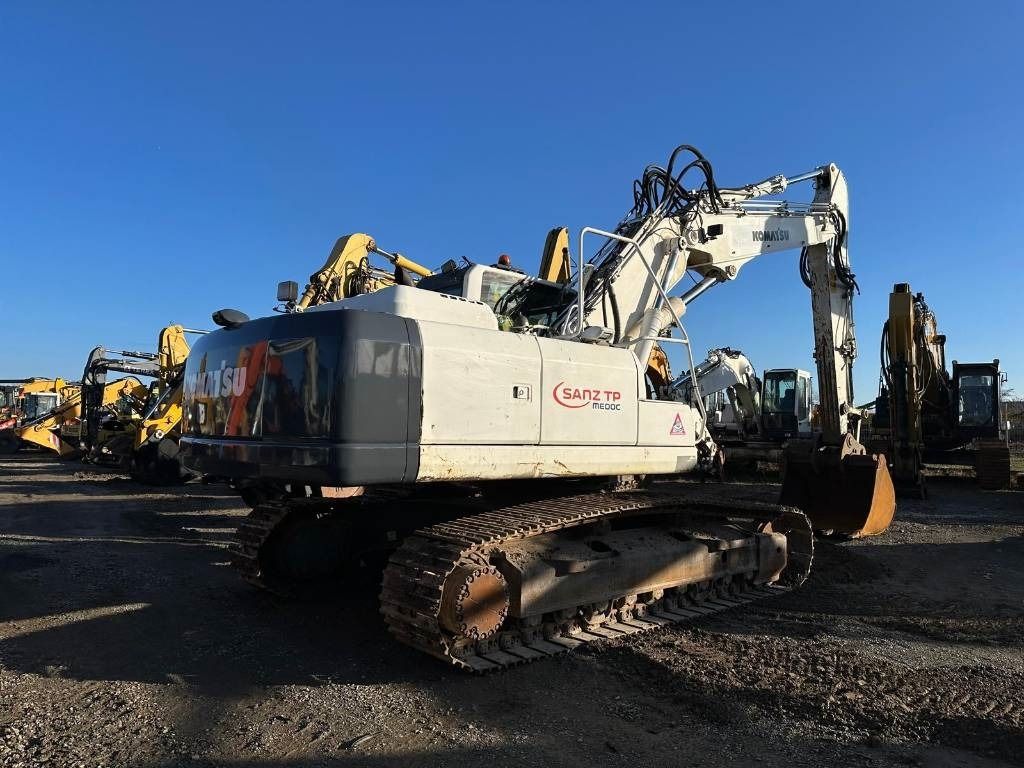 2012 Komatsu PC240NLC-8 crawler excavator, rear three-quarter view 2012 Komatsu PC240NLC-8 crawler excavator, rear three-quarter view