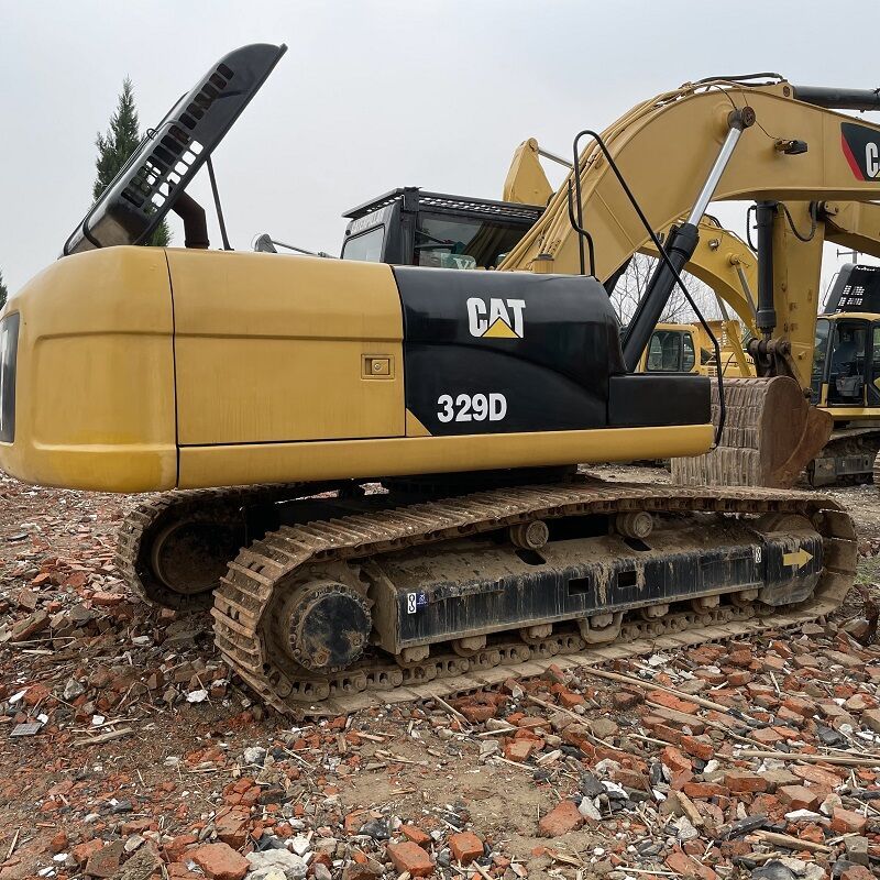 Caterpillar 329D crawler excavator, side view Caterpillar 329D crawler excavator, side view