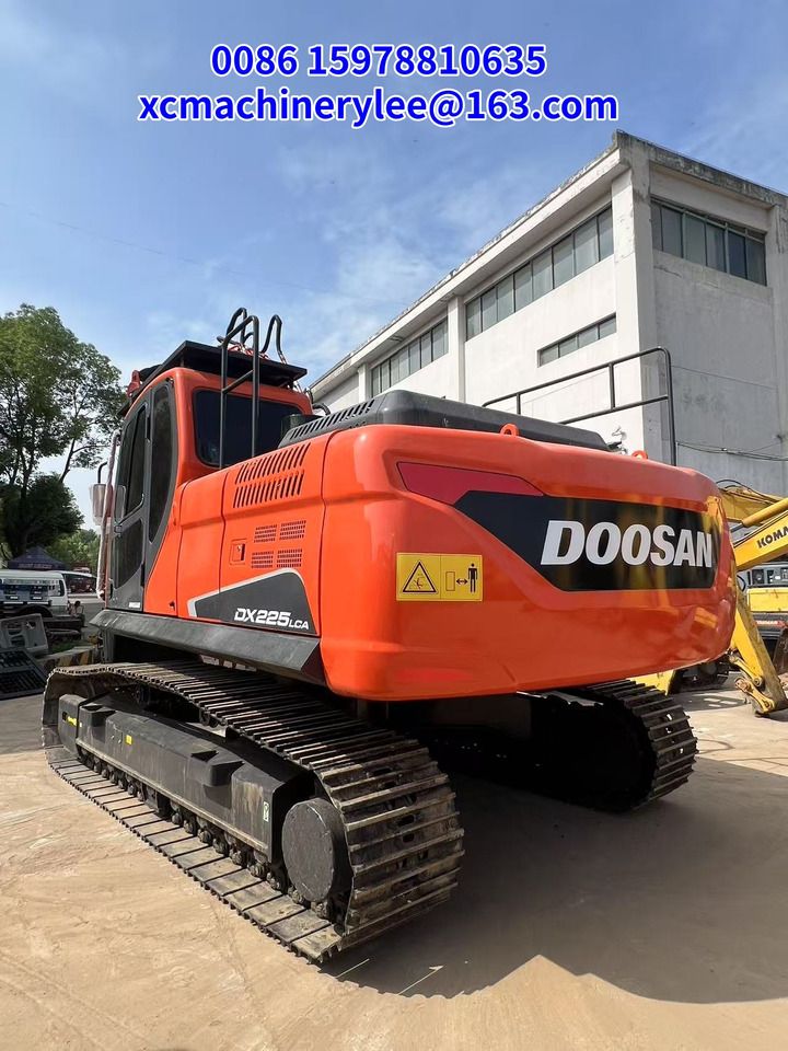 2023 Doosan DX225LCA crawler excavator, rear three-quarter view