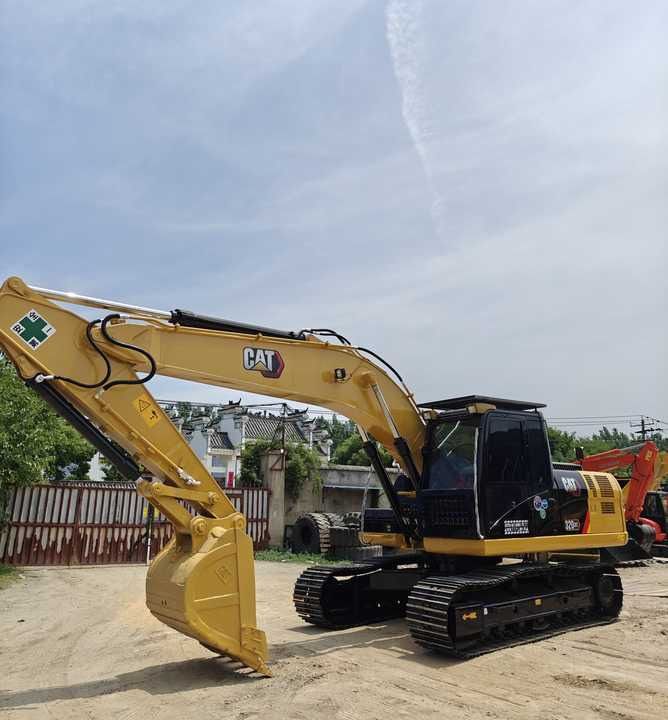Caterpillar 320GC crawler excavator, side profile view Caterpillar 320GC crawler excavator, side profile view