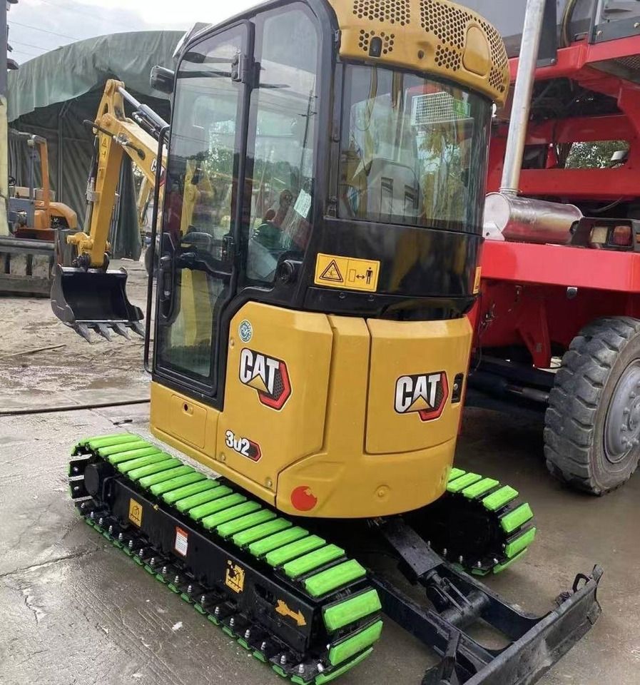 2023 Caterpillar 302 mini excavator, front three-quarter view 2023 Caterpillar 302 mini excavator, front three-quarter view