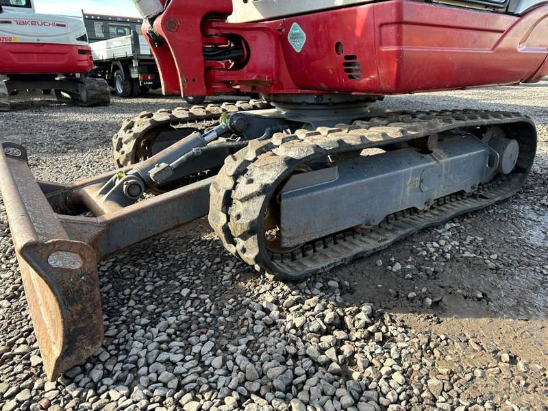 2011 Takeuchi TB 228 mini excavator undercarriage and blade view 2011 Takeuchi TB 228 mini excavator undercarriage and blade view
