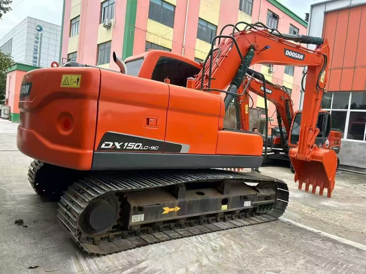 2023 Doosan DX150LC-9C crawler excavator, rear three-quarter view 2023 Doosan DX150LC-9C crawler excavator, rear three-quarter view