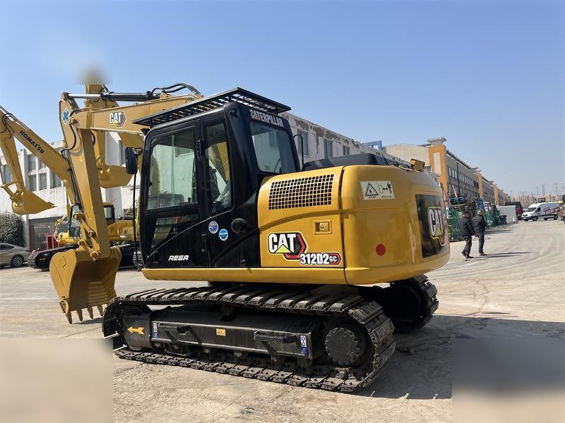 2023 Caterpillar 312D2 GC crawler excavator, rear three-quarter view 2023 Caterpillar 312D2 GC crawler excavator, rear three-quarter view