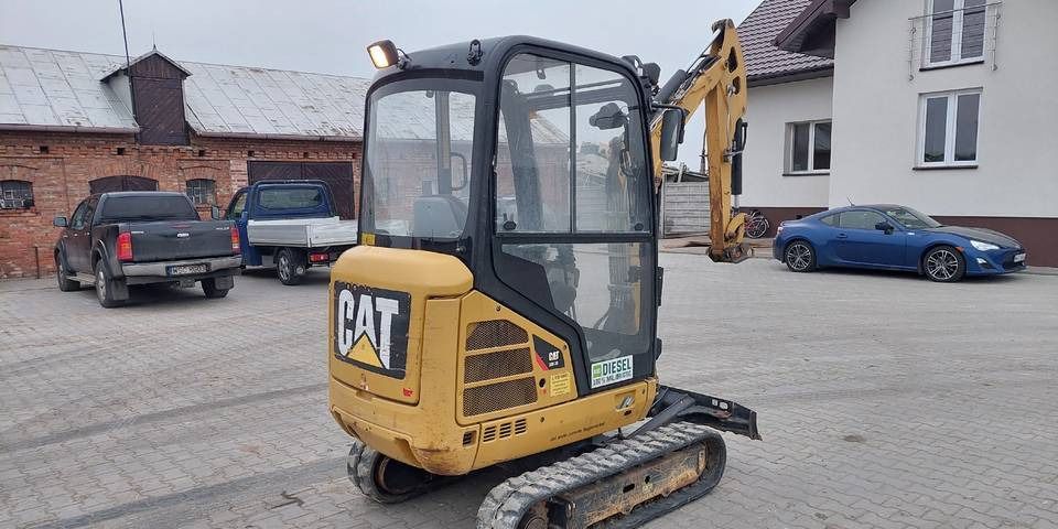 2016 Caterpillar 301.7D crawler excavator, rear three-quarter view 2016 Caterpillar 301.7D crawler excavator, rear three-quarter view