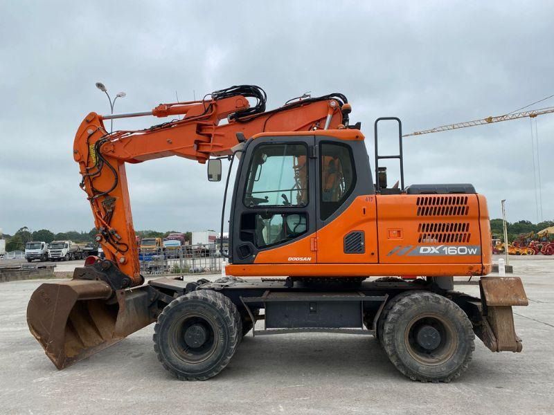 2016 Doosan DX160W wheel excavator, side profile view