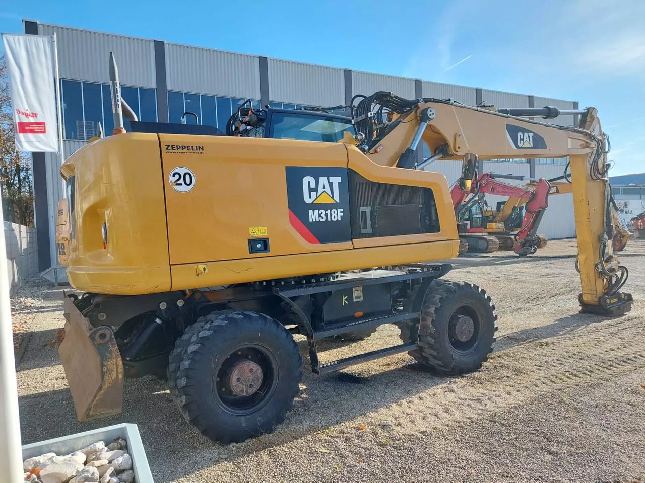 2017 Caterpillar M318F wheel excavator, rear three-quarter view 2017 Caterpillar M318F wheel excavator, rear three-quarter view