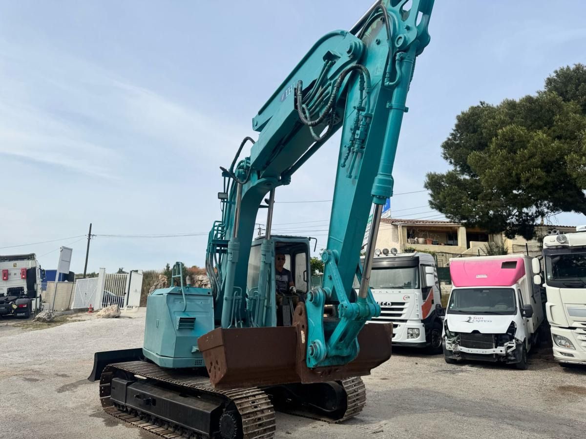 2007 Sumitomo SH 145 crawler excavator, rear three-quarter view 2007 Sumitomo SH 145 crawler excavator, rear three-quarter view