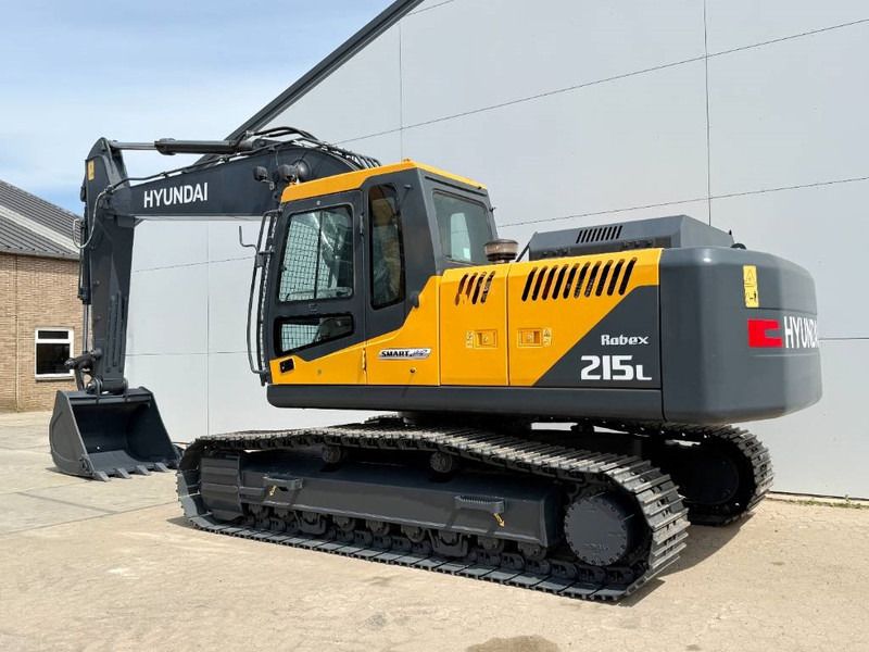2025 Hyundai R215 SMART PLUS crawler excavator, side view