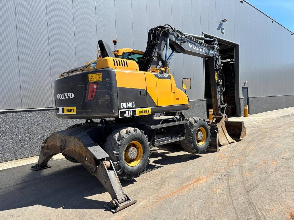 2017 Volvo EW140D wheel excavator, rear three-quarter view 2017 Volvo EW140D wheel excavator, rear three-quarter view