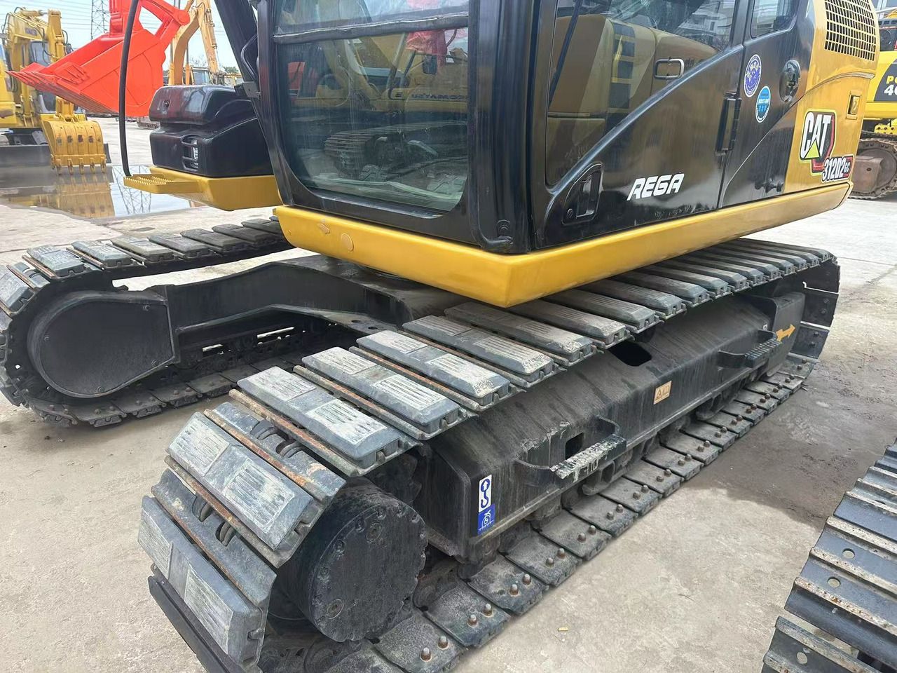 2021 Caterpillar 312D2 crawler excavator, side view of the cab and tracks