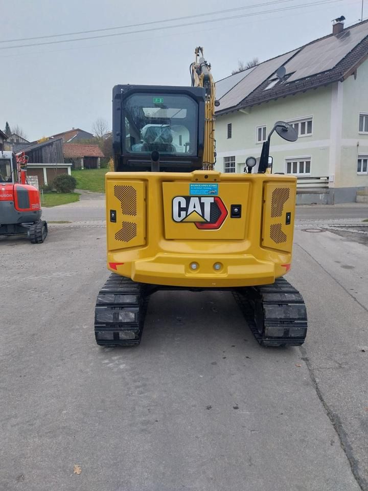 Caterpillar 306CR-07A mini excavator, rear view Caterpillar 306CR-07A mini excavator, rear view