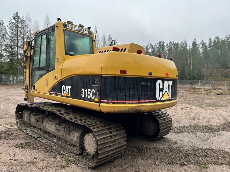 2004 Caterpillar 315C crawler excavator rear three-quarter view 2004 Caterpillar 315C crawler excavator rear three-quarter view