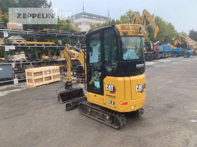 2023 Caterpillar 301.8-05A mini excavator, rear three-quarter view