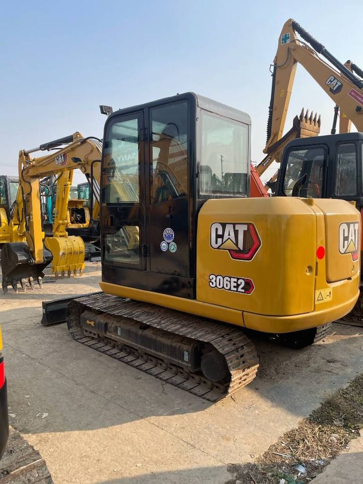 2025 Caterpillar 306E2 mini excavator, rear three-quarter view 2025 Caterpillar 306E2 mini excavator, rear three-quarter view