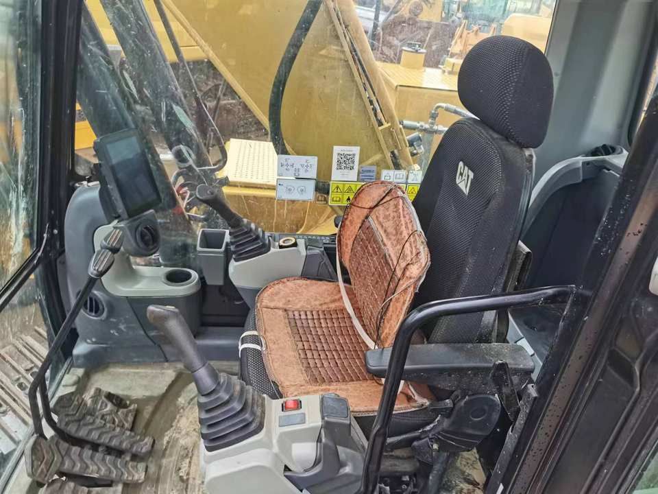 2021 Caterpillar 323 crawler excavator interior cab view
