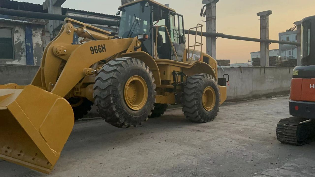 2020 Caterpillar 966H wheel loader, front three-quarter view 2020 Caterpillar 966H wheel loader, front three-quarter view