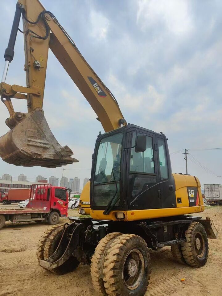 2023 Caterpillar 315D wheel excavator, front three-quarter view 2023 Caterpillar 315D wheel excavator, front three-quarter view