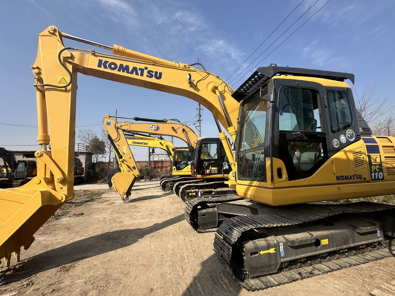 2023 Komatsu PC110-7 crawler excavator, side view