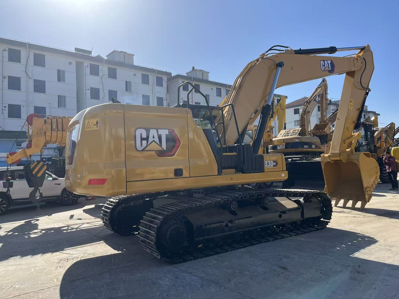 2024 Caterpillar 330GC crawler excavator, rear three-quarter view