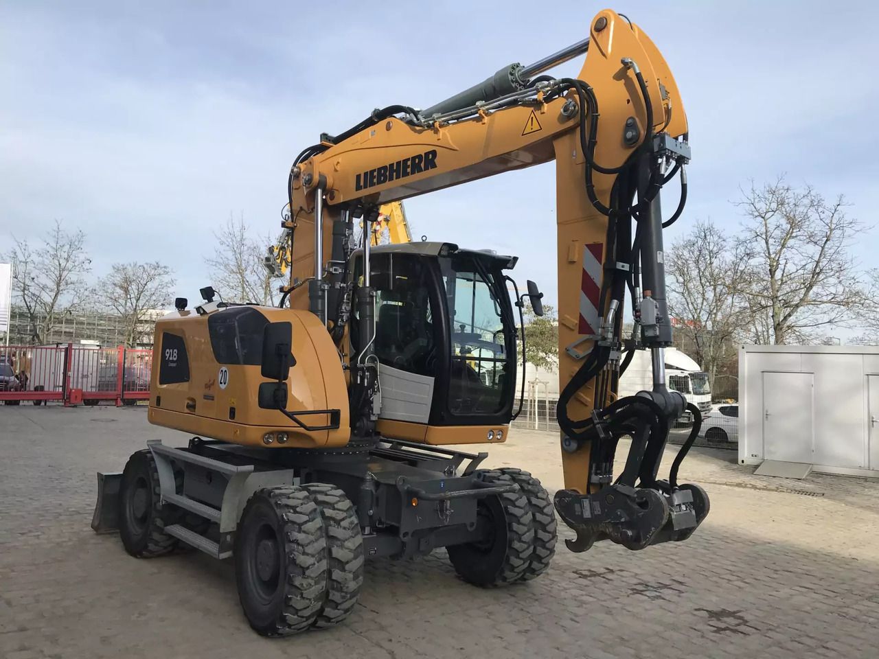 2023 Liebherr A918 Compact wheeled excavator, front three-quarter view 2023 Liebherr A918 Compact wheeled excavator, front three-quarter view