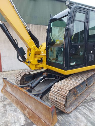 2015 Caterpillar 308 excavator, front three-quarter view 2015 Caterpillar 308 excavator, front three-quarter view