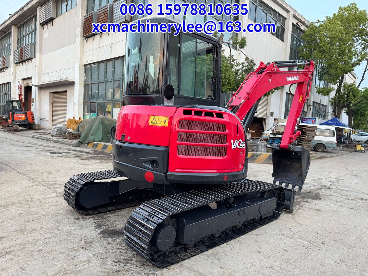 2024 Yanmar ViO55 mini excavator, rear three-quarter view 2024 Yanmar ViO55 mini excavator, rear three-quarter view