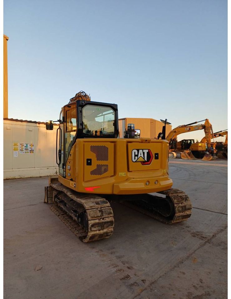 2023 Caterpillar 308 crawler excavator, rear three-quarter view 2023 Caterpillar 308 crawler excavator, rear three-quarter view