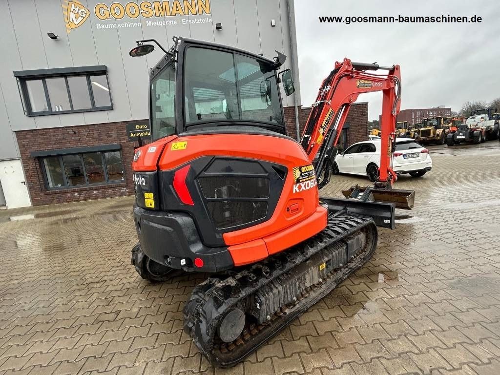 2023 Kubota KX060-5 mini excavator, rear three-quarter view 2023 Kubota KX060-5 mini excavator, rear three-quarter view