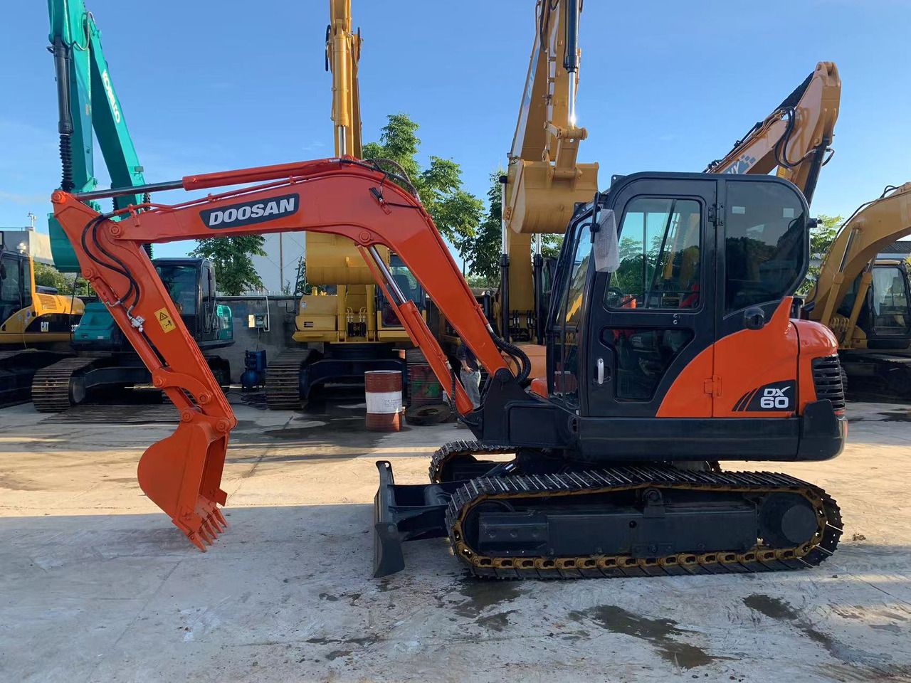 2021 Doosan DX60 mini excavator, side view 2021 Doosan DX60 mini excavator, side view