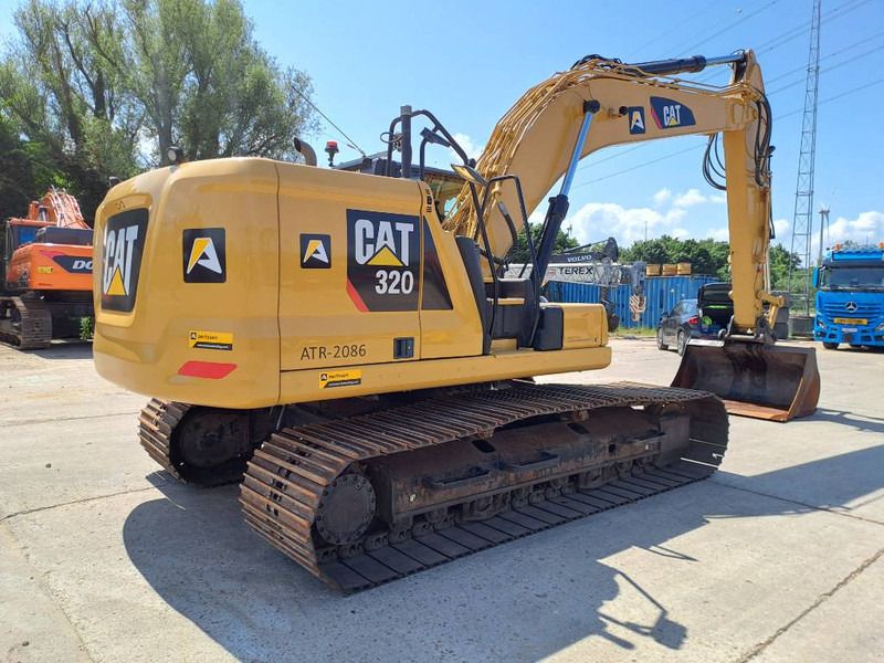 2018 Caterpillar 320 crawler excavator, rear three-quarter view 2018 Caterpillar 320 crawler excavator, rear three-quarter view